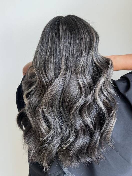 Silver highlights and balayage hair color by Angie in Humble TX